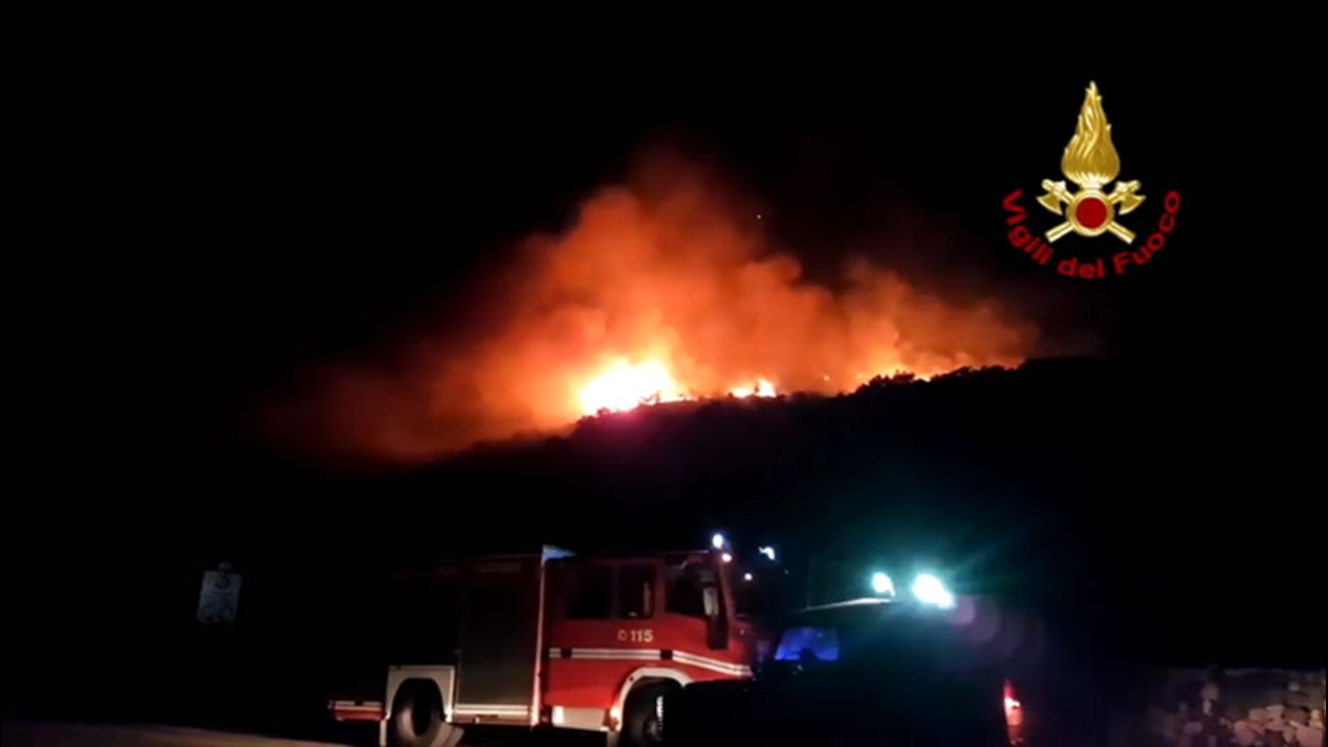 Fire crews used helicopters to battle a wildfire raging in Castiglione di Sicilia, Italy, on Aug. 20. Multiple buildings were reportedly threatened by the wildfire.