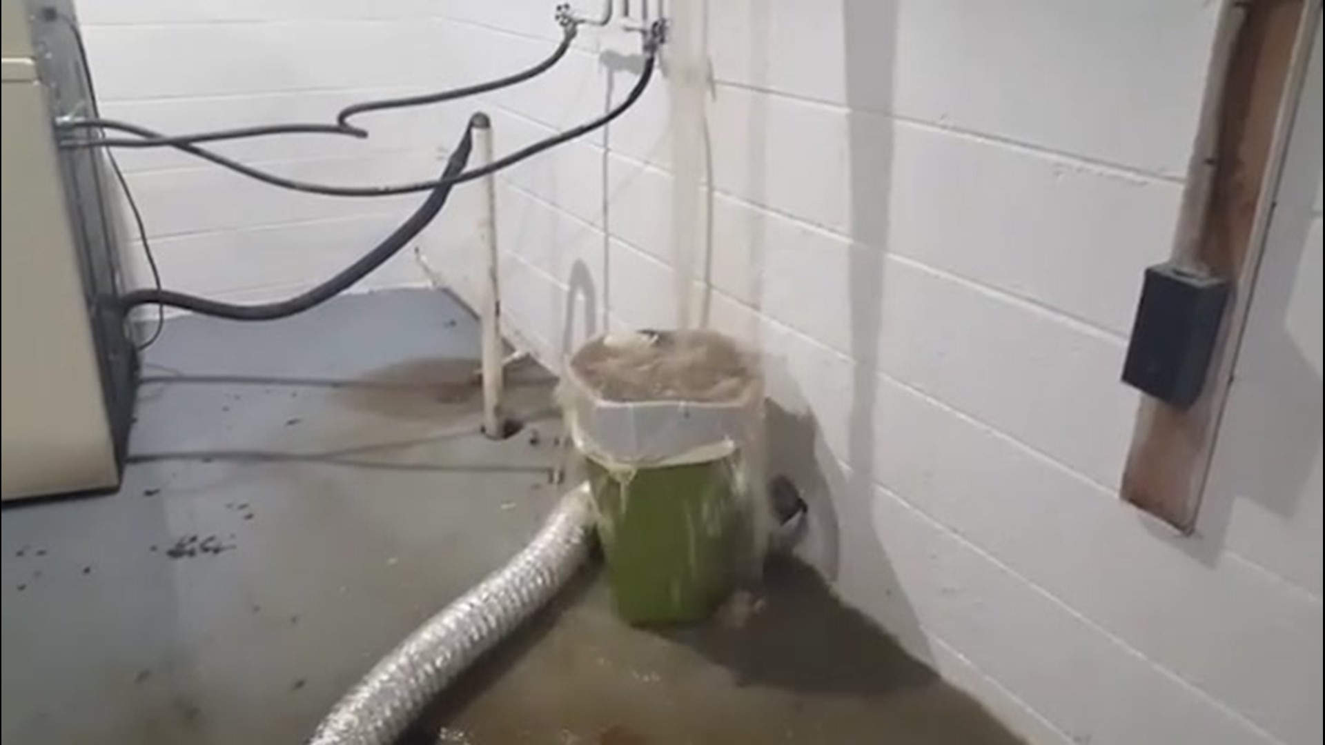 This basement is overwhelmed as floodwaters spill into this home in Westfield, Indiana, on March 28. That trash can proved to be ineffective as well.