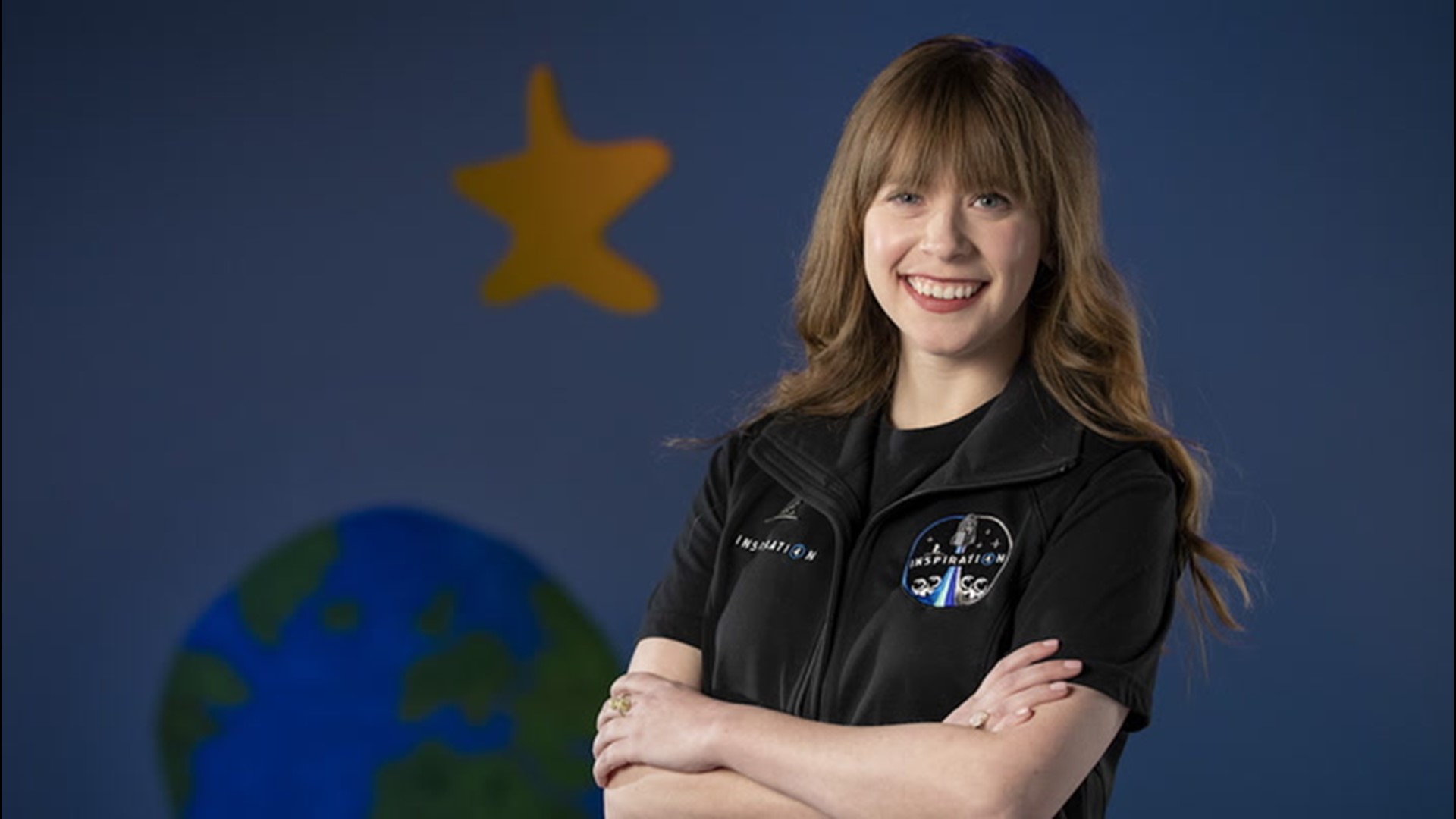 Hayley Arceneaux, 29-year-old cancer survivor, has been selected as the second crew member of the upcoming Inspiration4 SpaceX trip to space, making her the youngest American to leave the atmosphere.