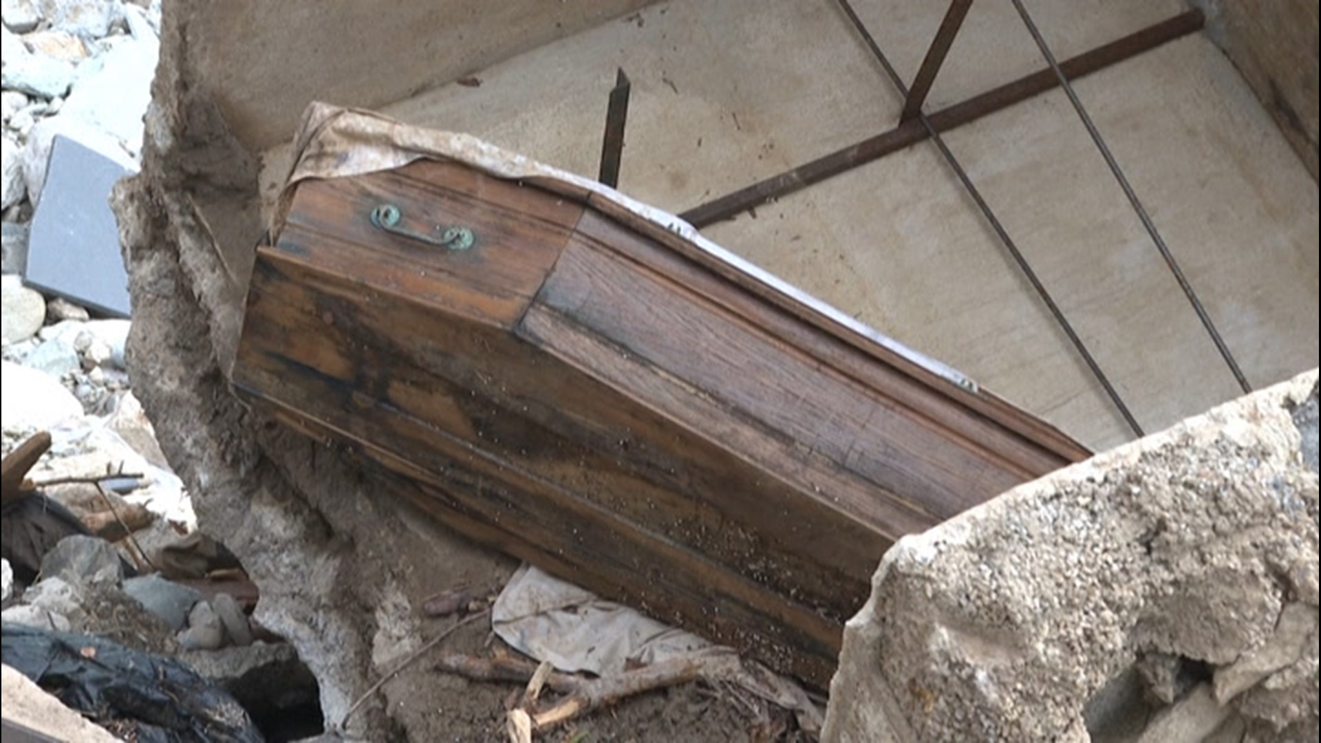 Flooding strikes cemetery, forcing caskets out of ground | cbs8.com