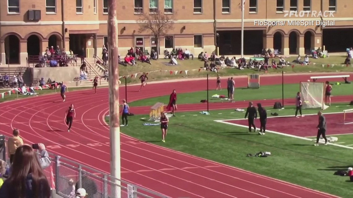 Dog breaks loose from owners and wins relay race at track meet 2 Dog breaks loose from owners and wins relay race at track meet