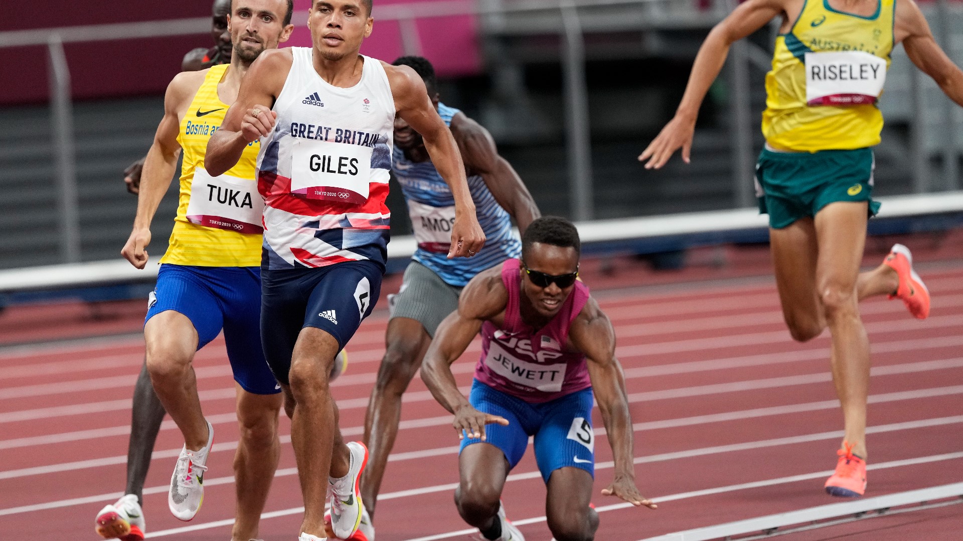 After collision, Olympic runners help each other to finish line | cbs8.com