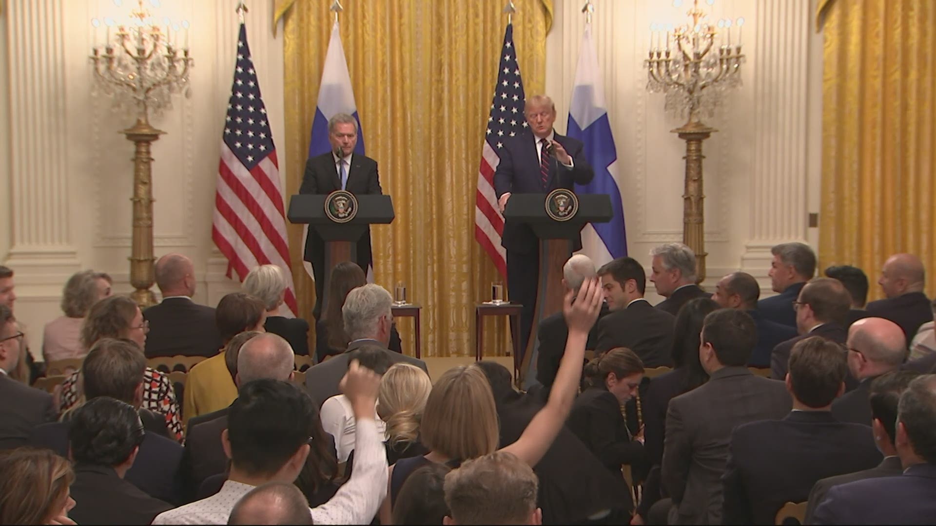 At one point, Trump demanded that a reporter pressing him on his dealings with Ukraine move on, labeling the journalist 'corrupt.'