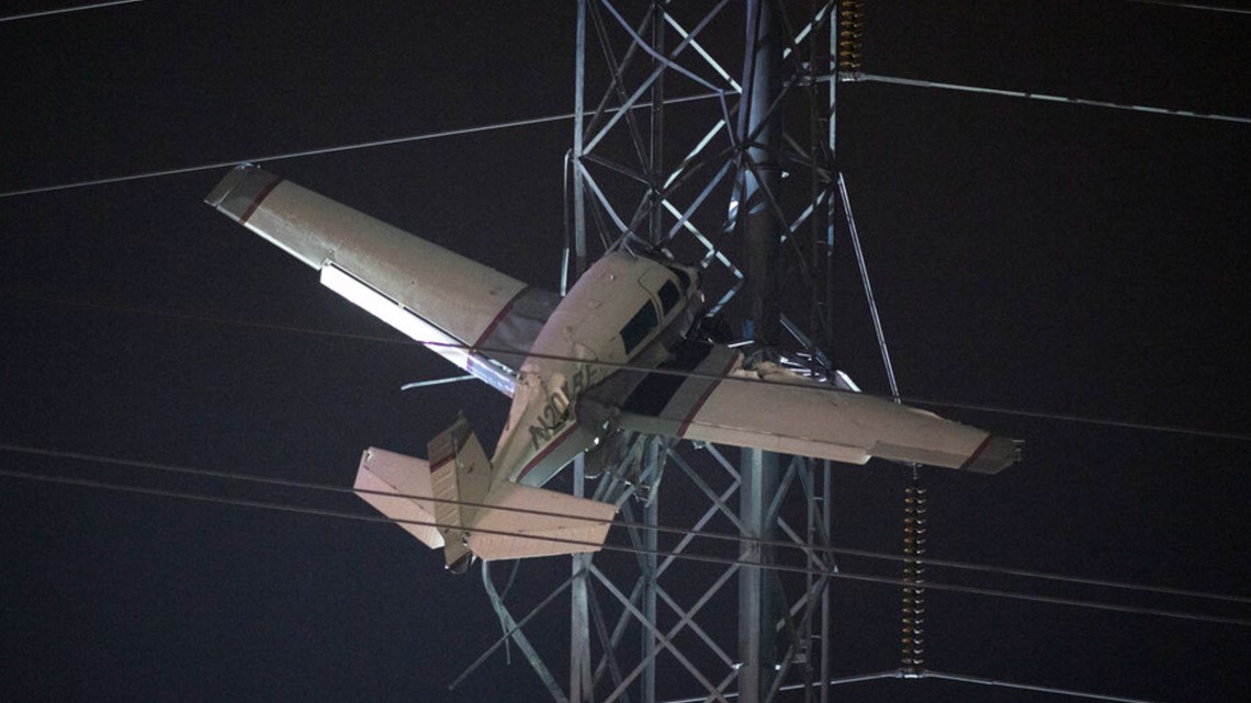 2 rescued from plane caught in Maryland power lines after crash | cbs8.com