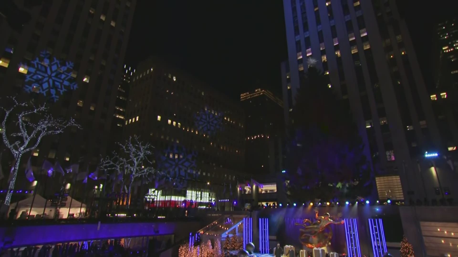 Rockin' around the Christmas tree looks different for visitors at New York City's Rockefeller Center this year, starting with the tree lighting ceremony.