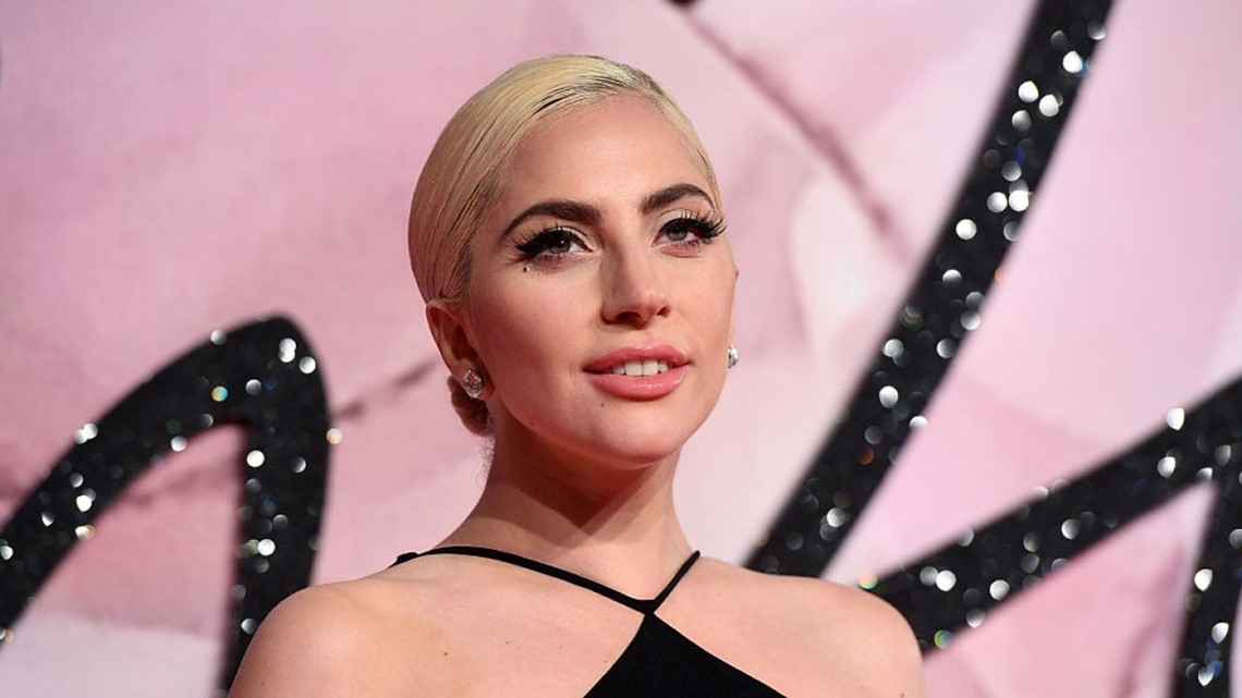 Lady Gaga wows Oscars in fresh off the runway Versace gown