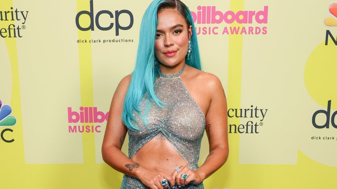 8. Karol G's blue hair and blue and black leather outfit at the 2014 Billboard Latin Music Awards - wide 5
