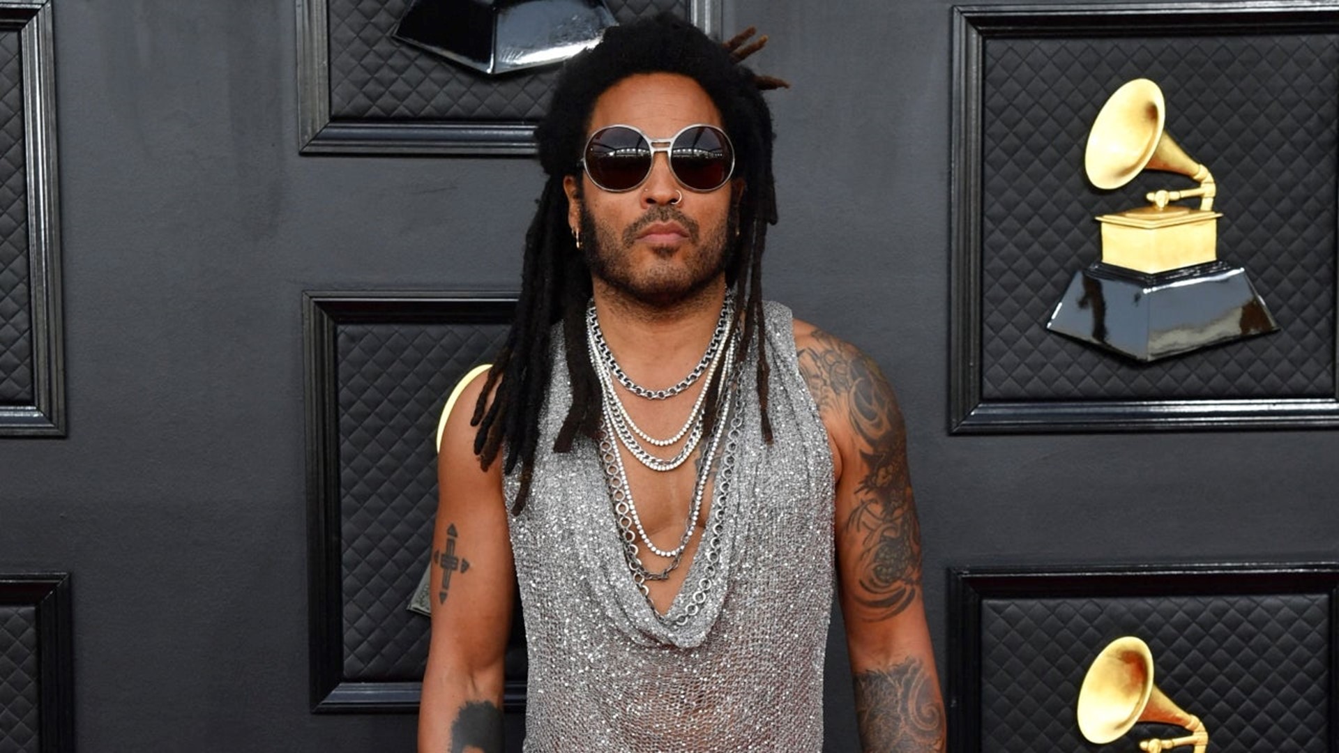 Lenny Kravitz Heats Up the GRAMMYs Red Carpet With SeeThrough Top