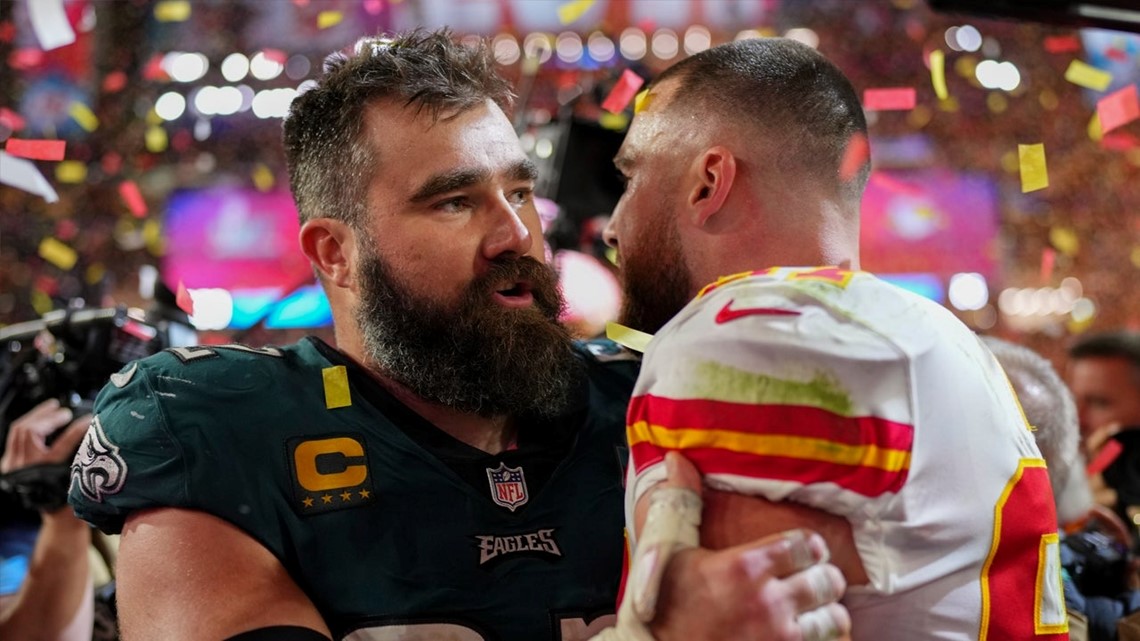 Travis and Jason Kelce Share Hug on the Super Bowl Field