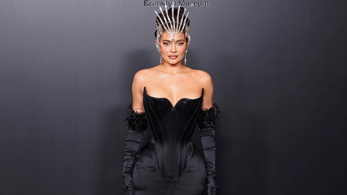 kylie jenner black dress with crown Shuffles Onto Red Carpet in Fitted Gown While Wearing Diamond-Covered Crown: 'It's Worth It!' Color:Buttons - White Floral LeatherType:SUEDE CALF 100% Ann Summers Paisley diamante