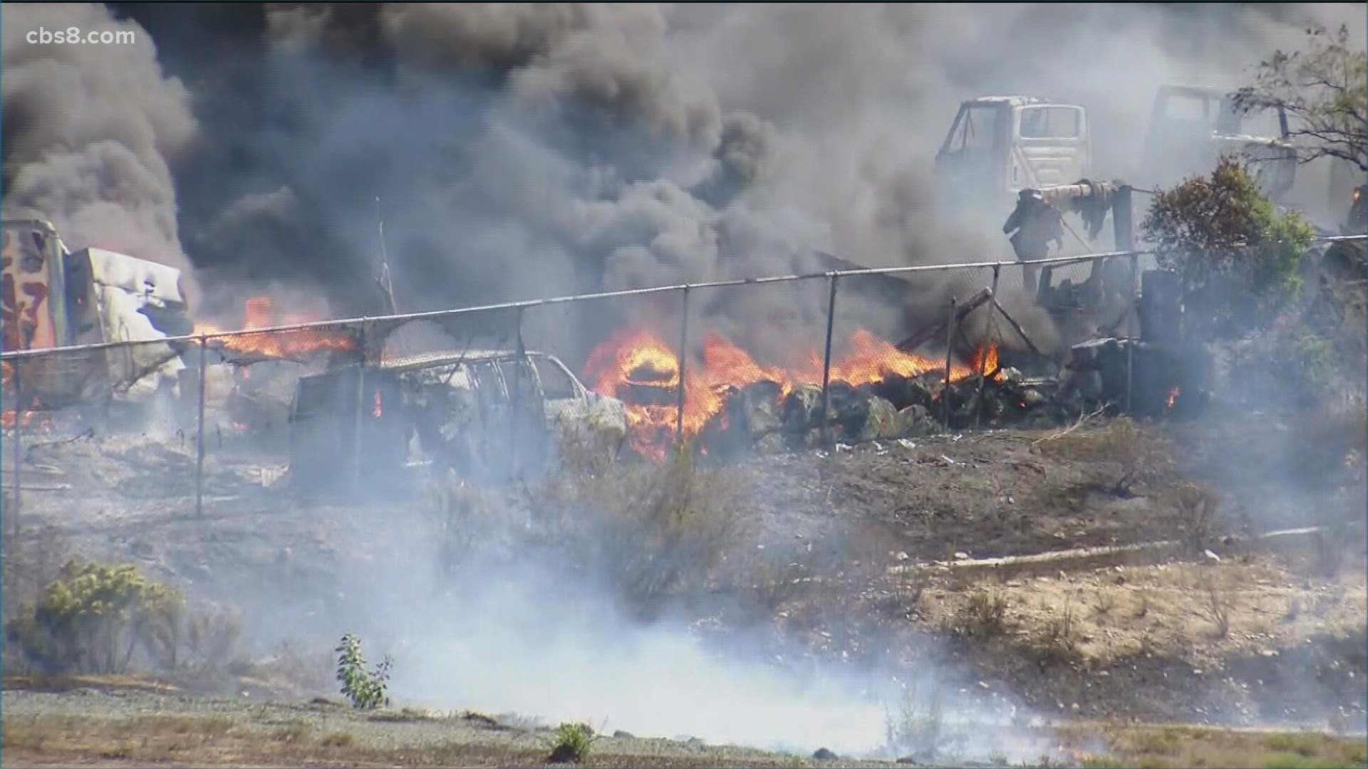 Twenty people were evacuated Saturday near a large fire that destroyed an estimated 200 vehicles at a wrecking yard.