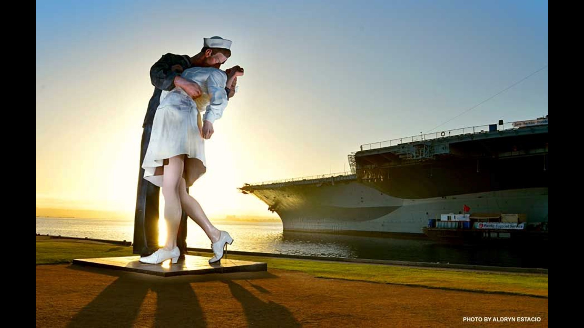 Replica 'kissing statue' bolted into place Wednesday
