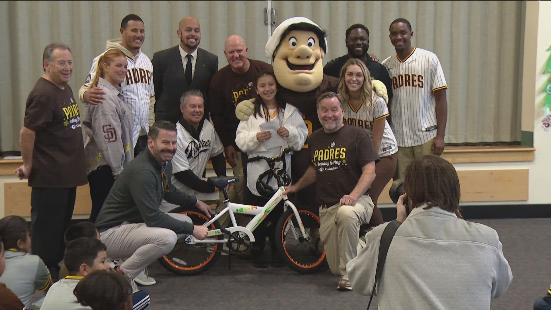 The Padres brought their Holiday Giving Tour to Porter Elementary where 120 lucky third graders were surprised with new bikes for the holidays.