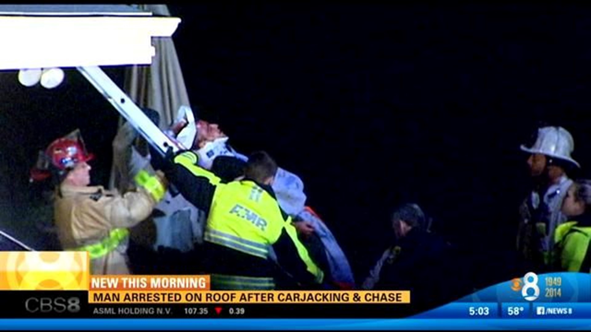 Man arrested on roof after carjacking and chase | cbs8.com