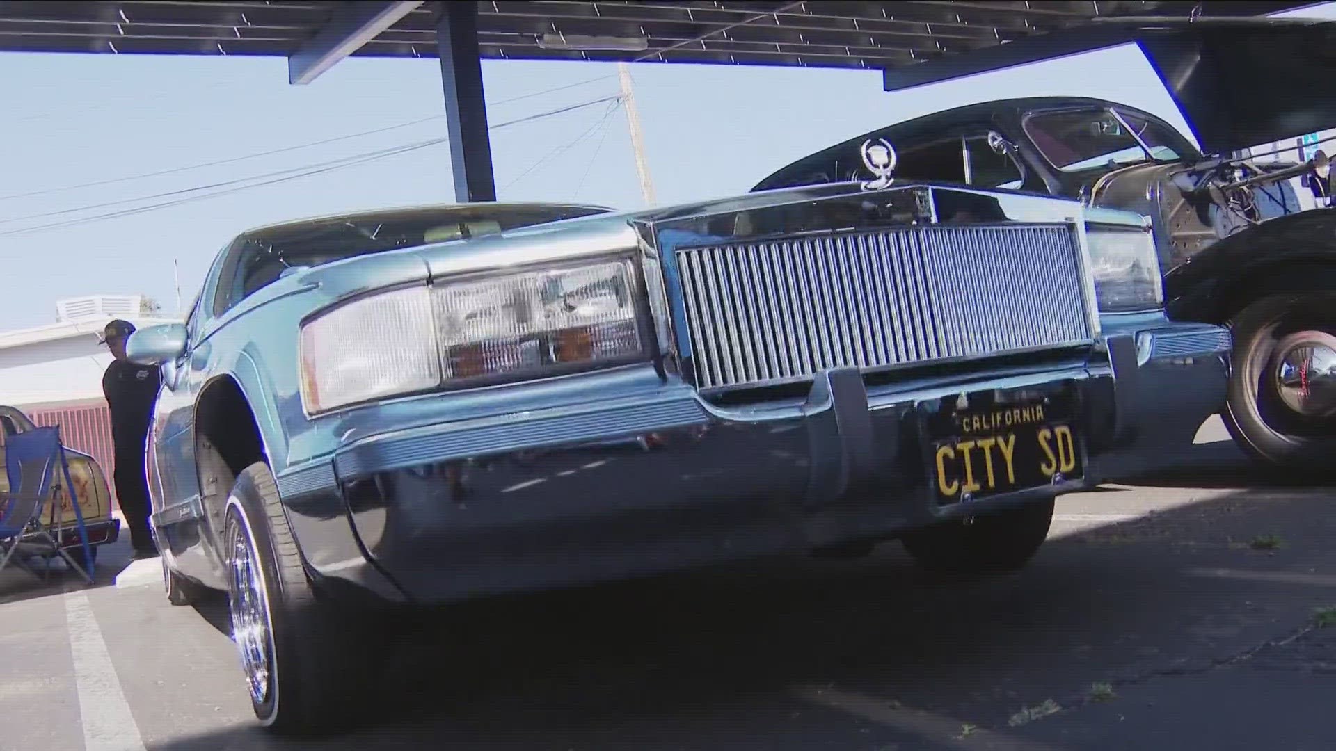 The United Lowrider Coalition celebrates the end of a decades-old ban on cruising in National City as the last "No cruising zone" is taken down.