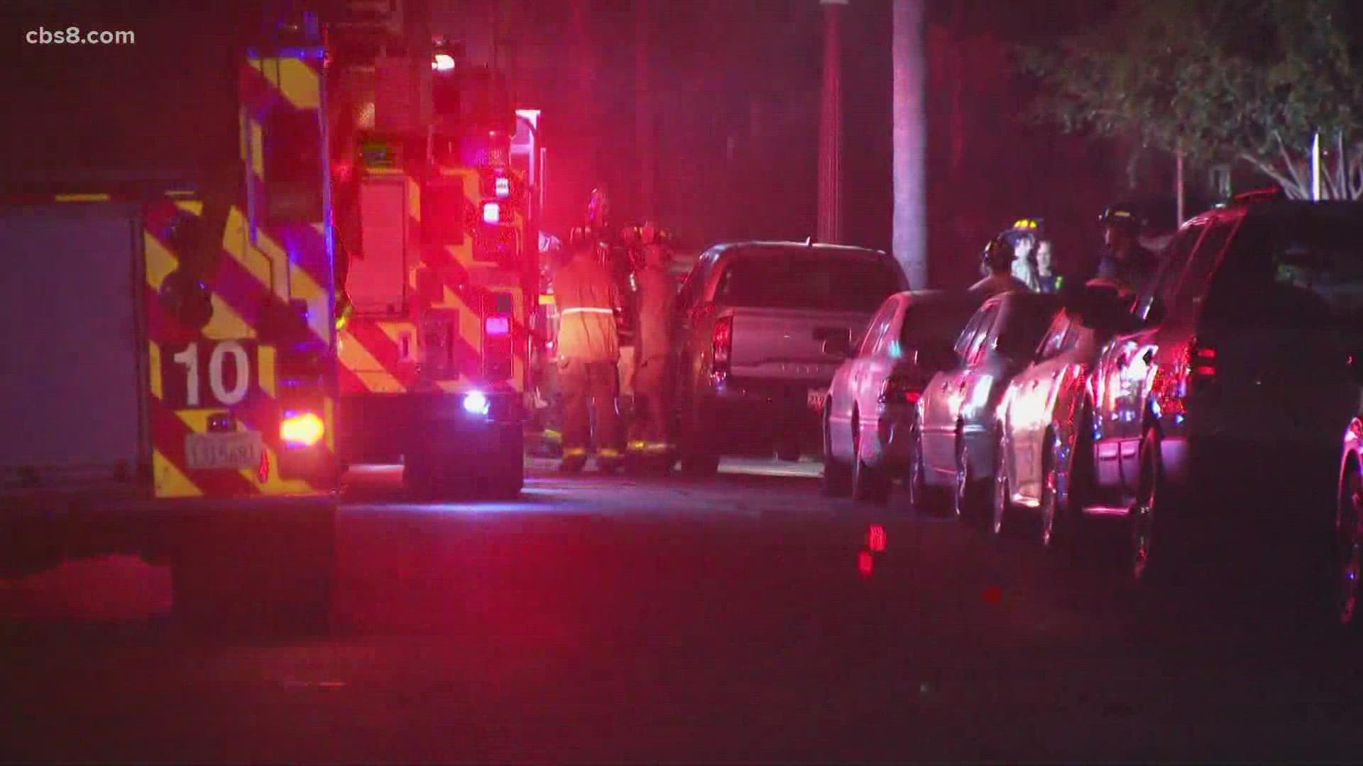 San Diego Police say at 8:50 p.m., a neighbor saw smoke and flames from a nearby home and called 911.
