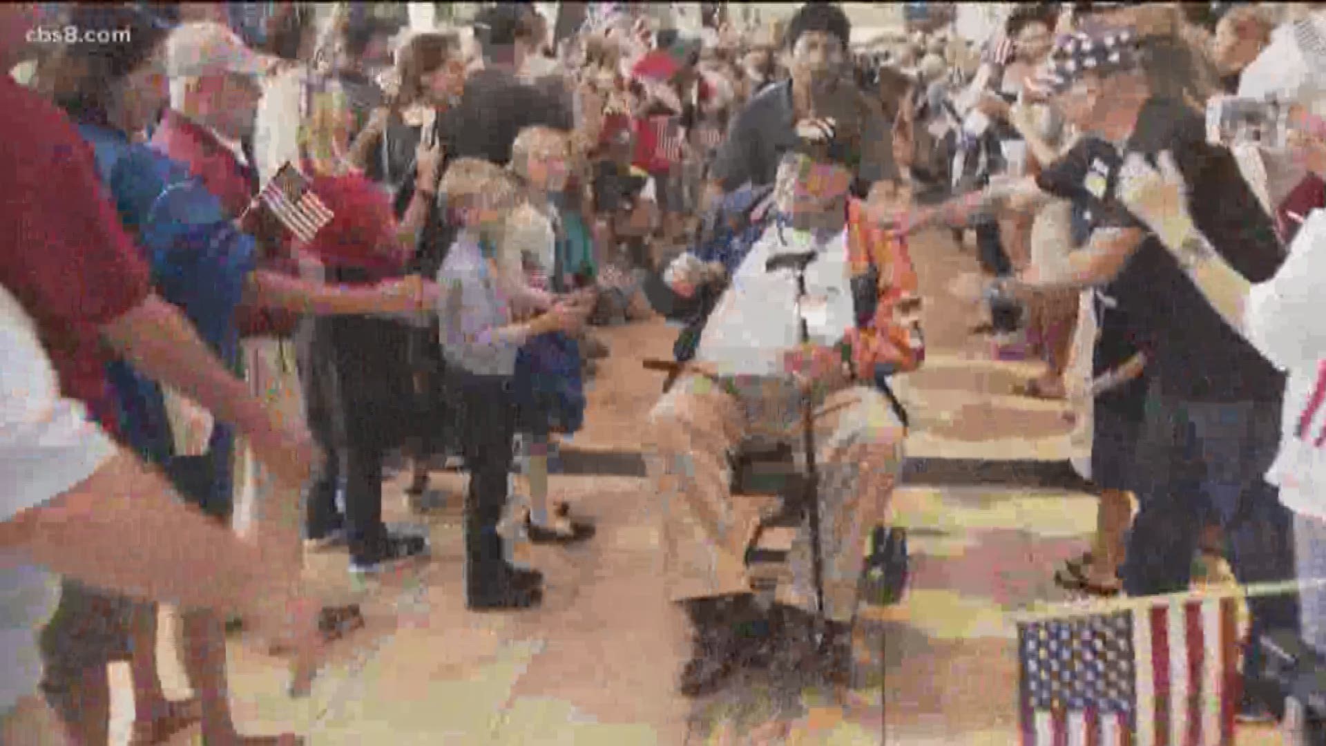 Around 1,000 people lined up at San Diego International Airport to welcome the veterans home.