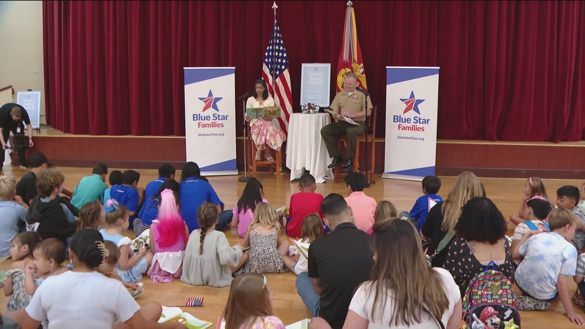 Vance read "Norman and the Smell of Adventure" to the assembled Blue Star Families, highlighting the importance of literacy and community support for military kids.