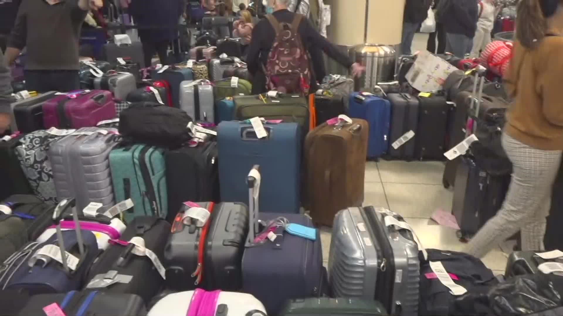 Bags everywhere! Luggage from canceled flights in San Diego piles up
