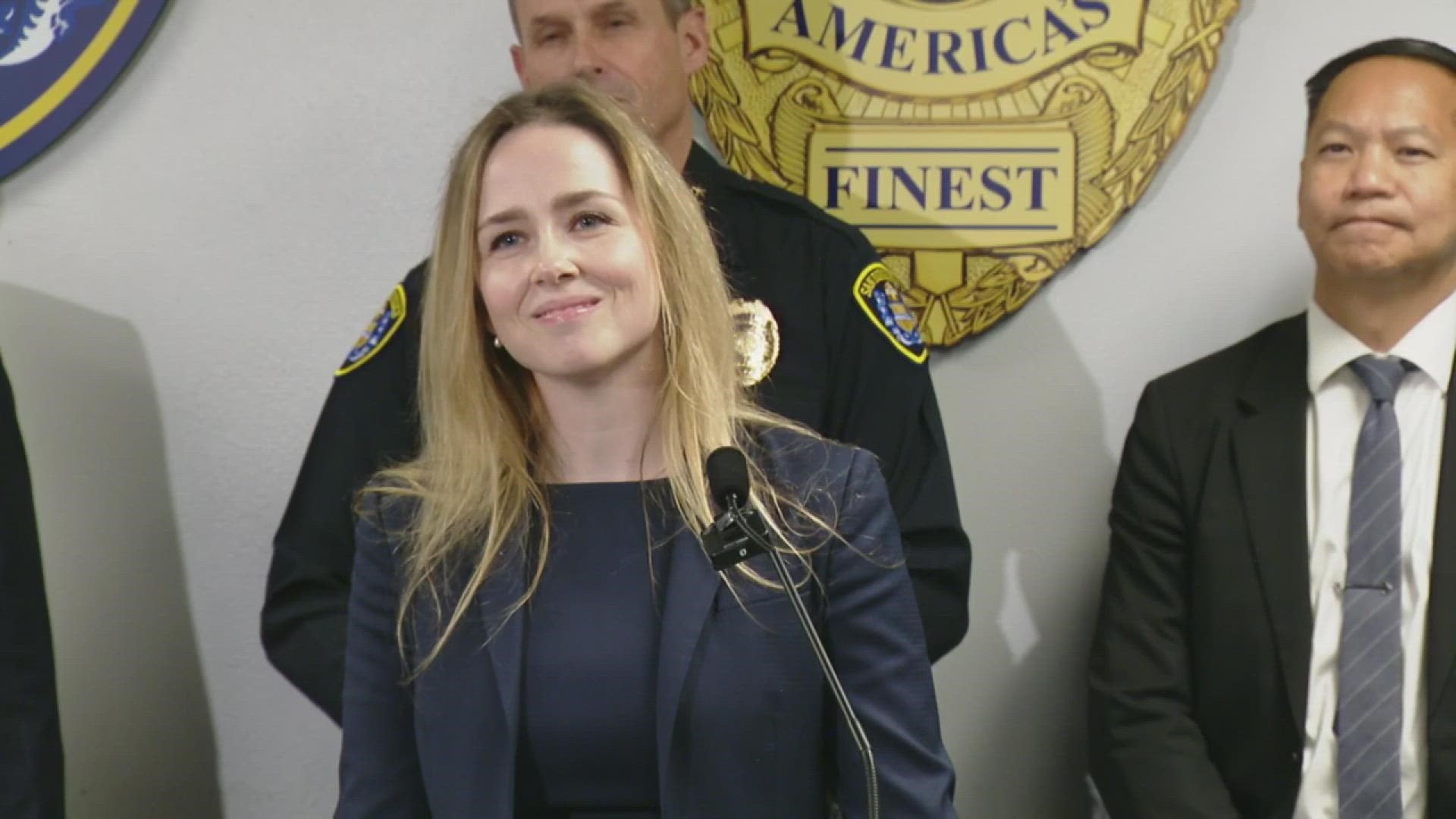 Deputy District Attorney Miriam Hemming responds to questions about SDPD officers and FBI agents raiding homes with search warrants last week.