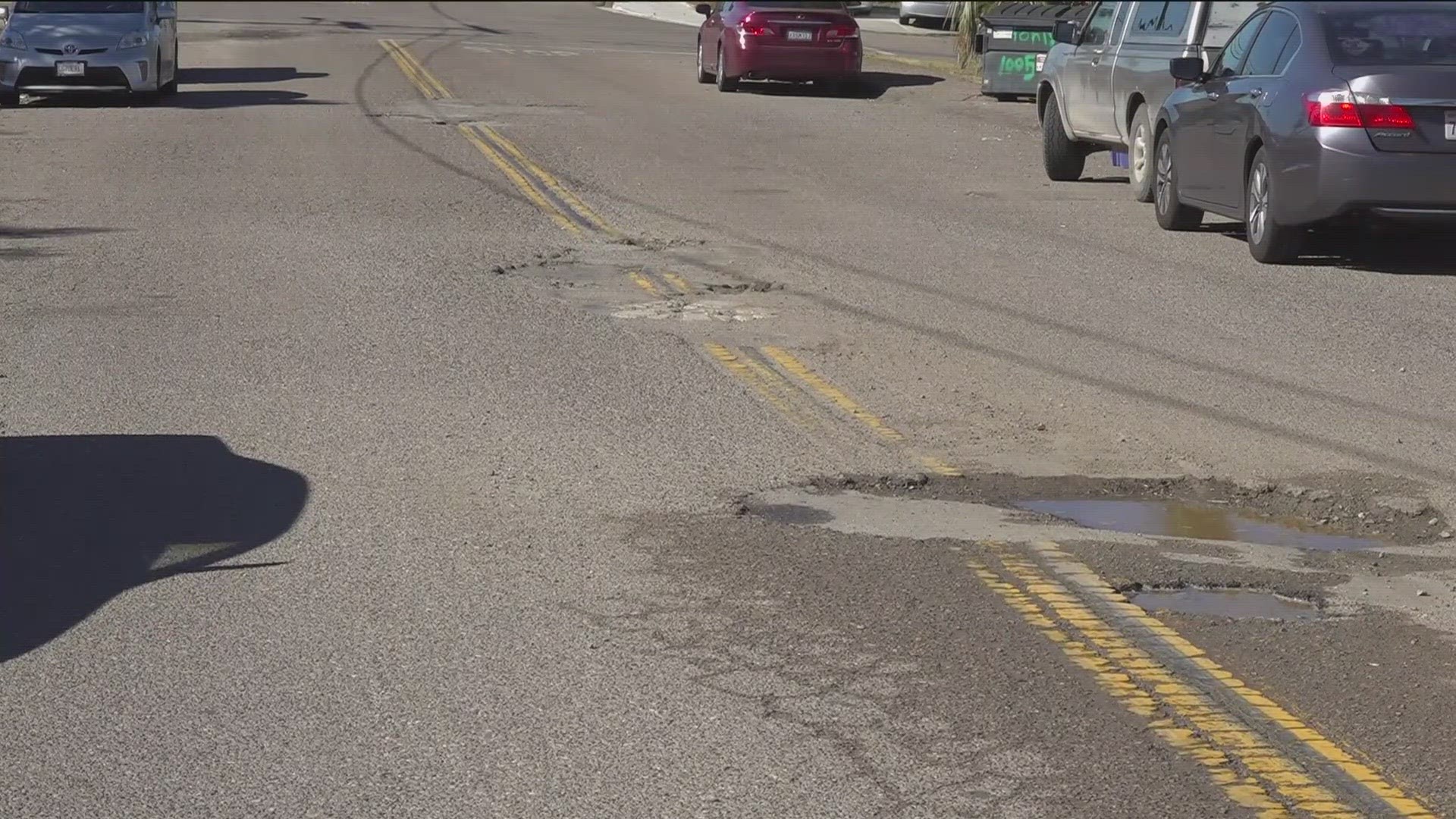 Deep potholes on Saint George Street are causing concern but San Diego County officials say this road's maintenance is not within its jurisdiction.