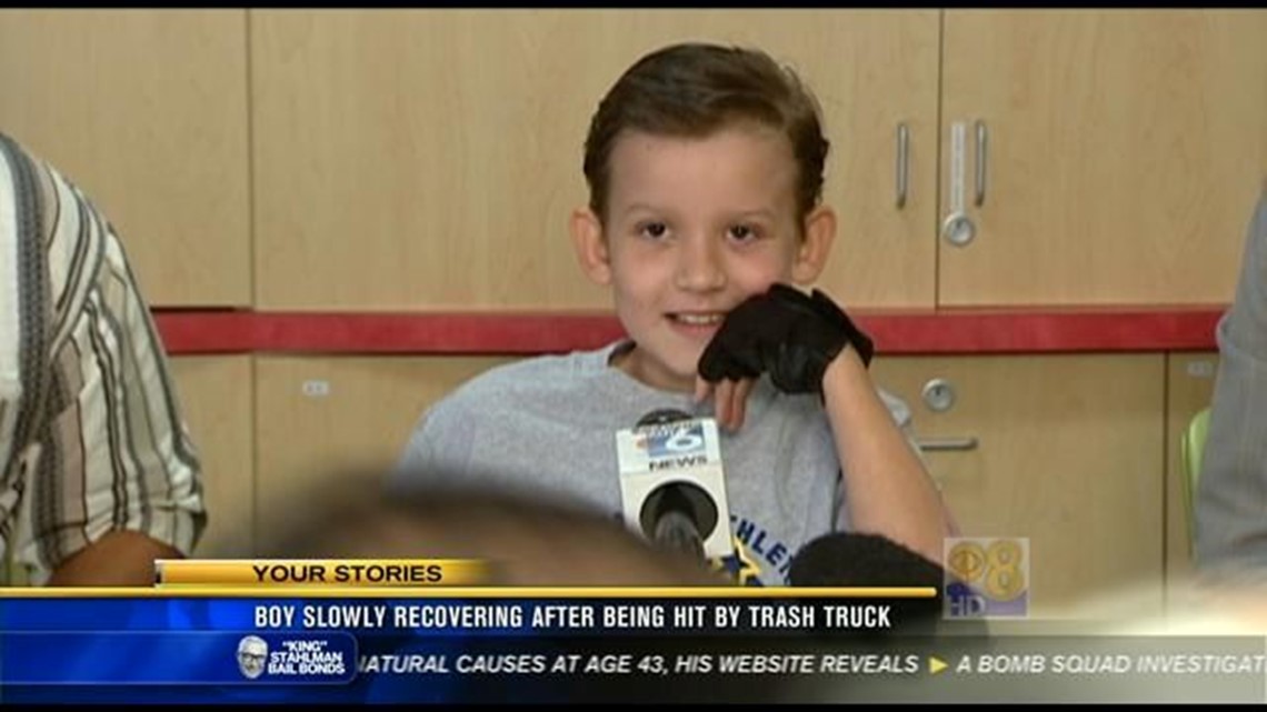 Boy slowly recovering after being hit by trash truck | cbs8.com