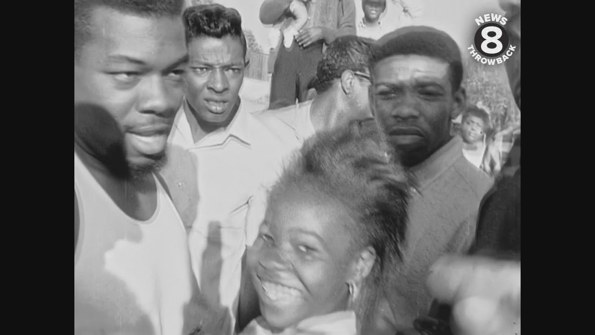 Muhammad Ali protects a CBS 8 news crew from angry mob while visiting San Diego in 1967.