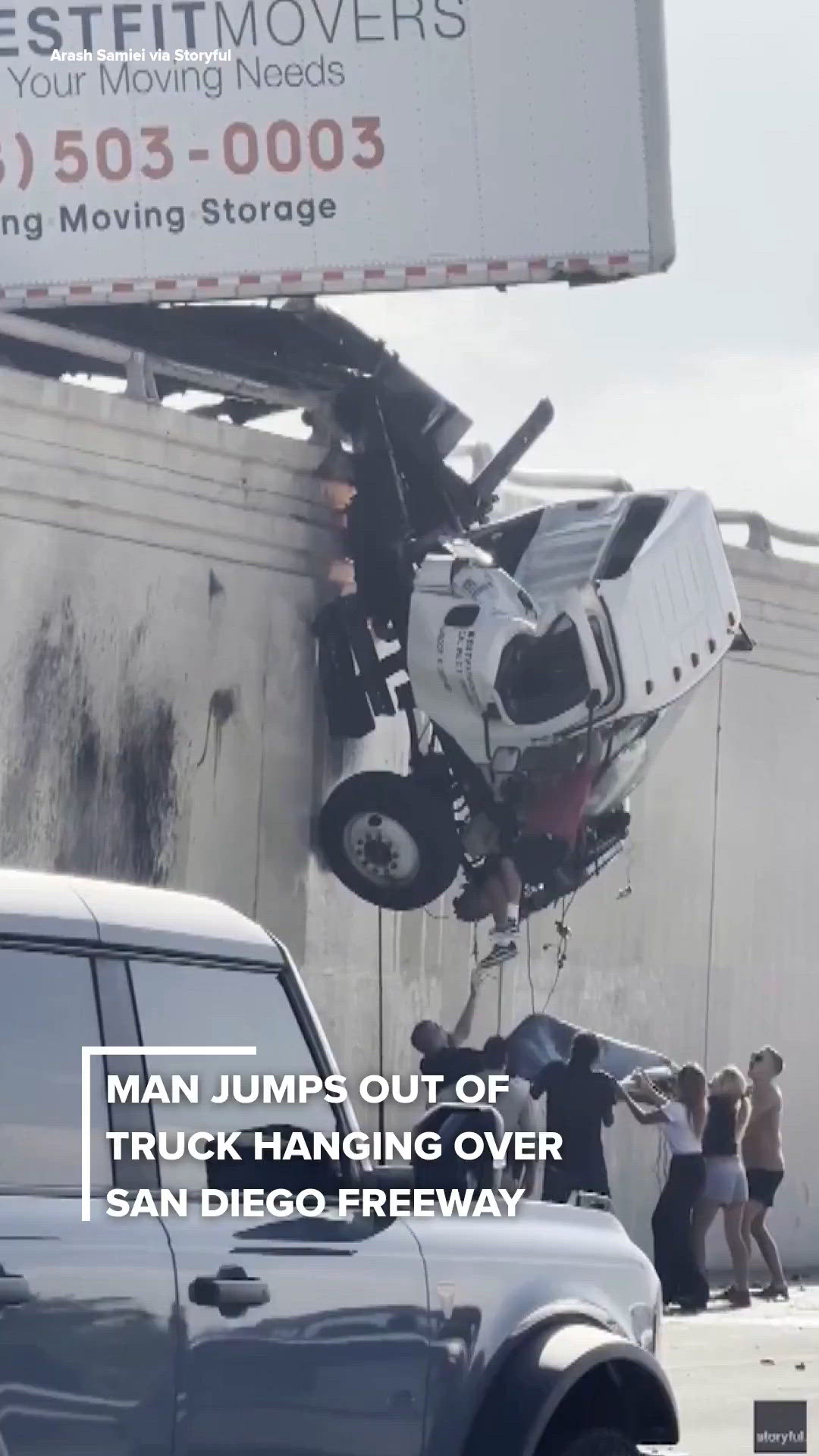Man escapes burning semi-truck hanging over San Diego freeway | cbs8.com