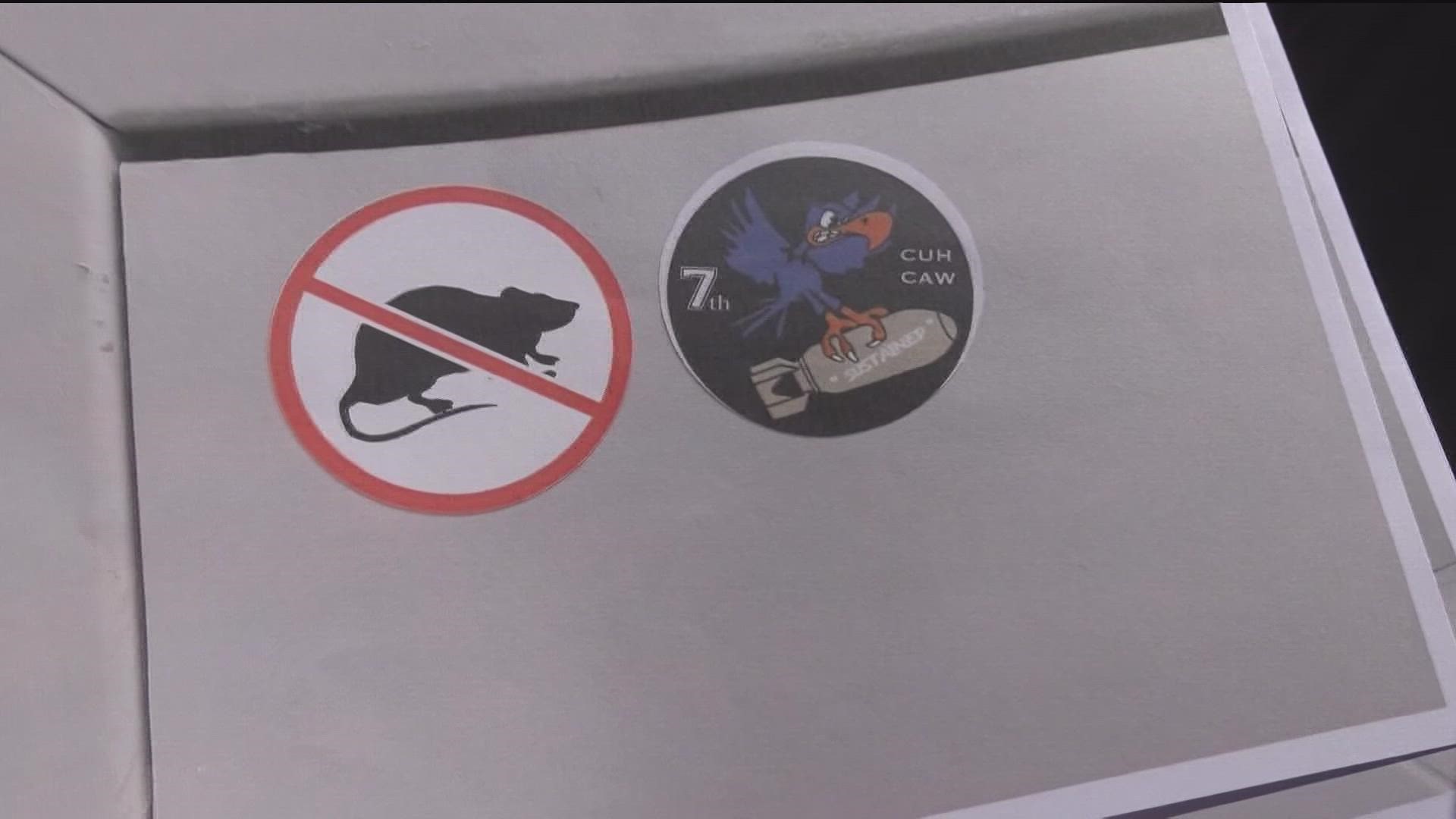 'No rats' and 'blue falcon' stickers warn officers not to snitch on other officers, activists said.