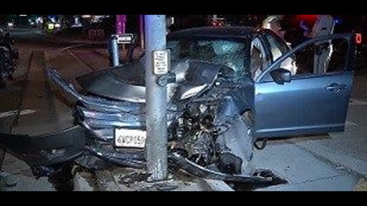Woman arrested for DUI after crashing head-on into light pole | cbs8.com