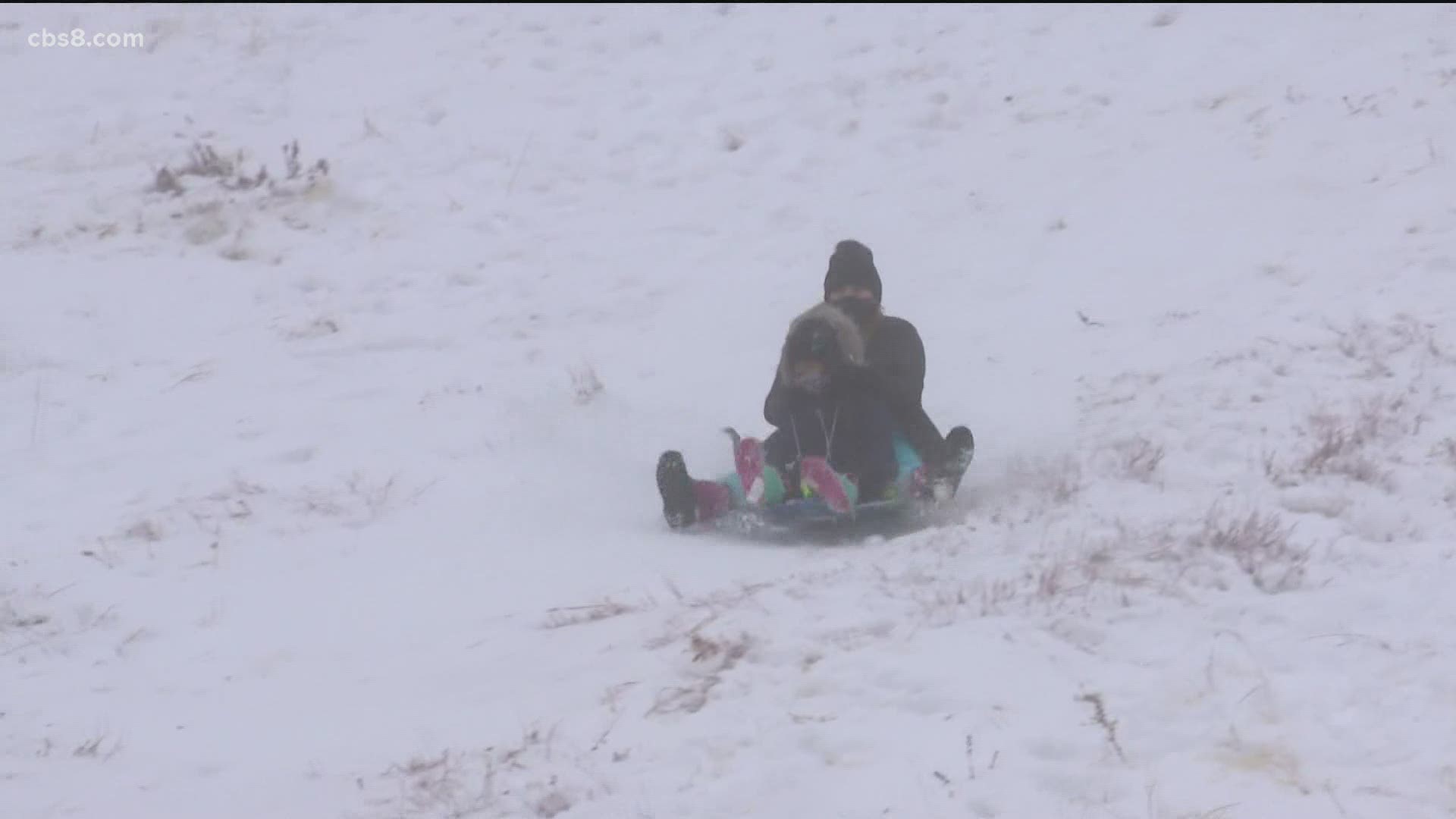 It's the second day of wintery weather for the mountains after a winter storm brought snow to San Diego's.