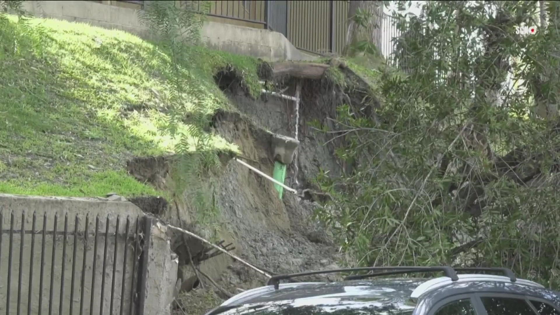 Residents were displaced at a Vista apartment complex after a leak that residents complained about possibly caused a mudslide and trees to topple over.