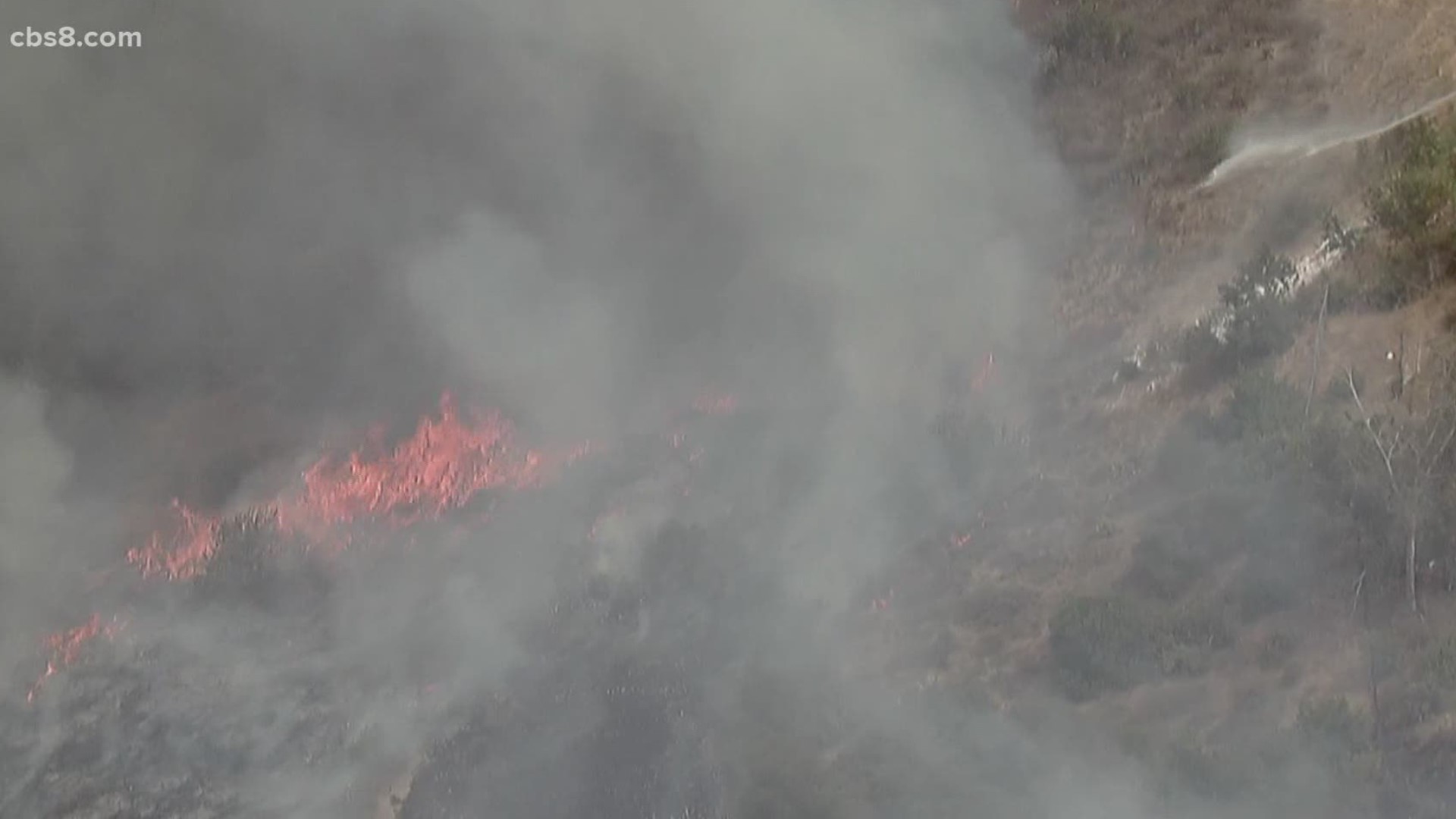 Structures along a canyon off Polaris Drive were threatened at one point, SDFD said in a tweet.