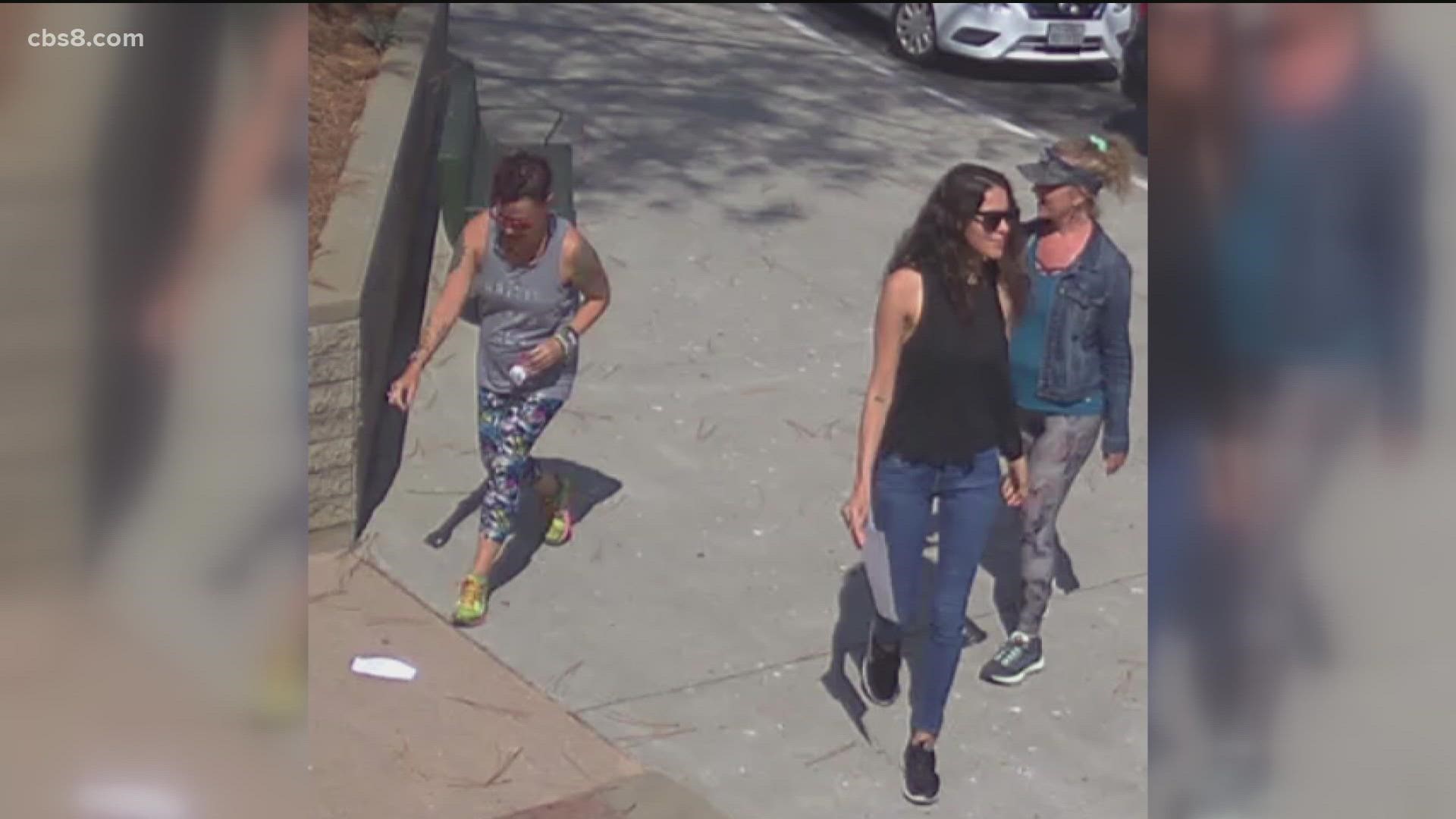 Three women are shown on school surveillance video of taking down state mask guidance signs and putting up their own anti-mask posters at two San Dieguito Union High