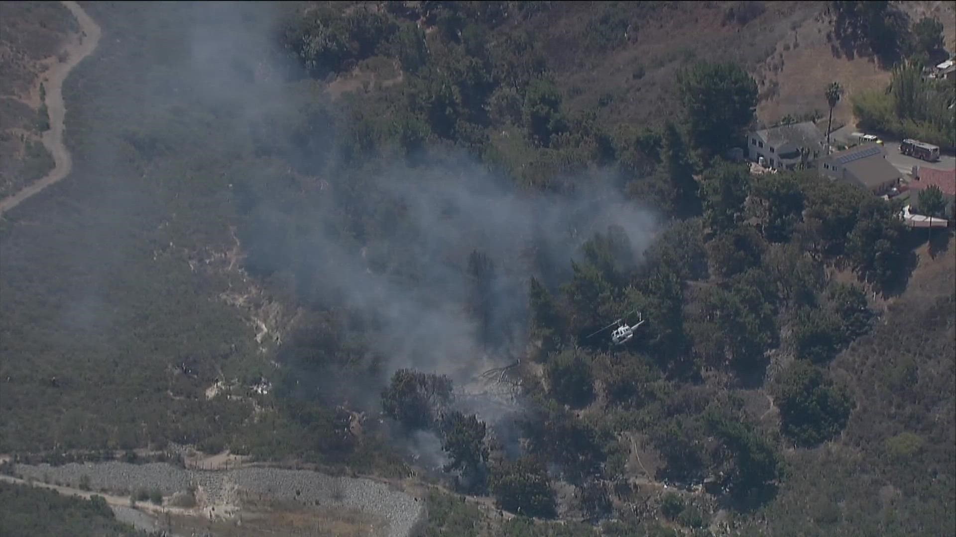 Firefighters battle brush fire burning in Oceanside near 2800 Industry ...