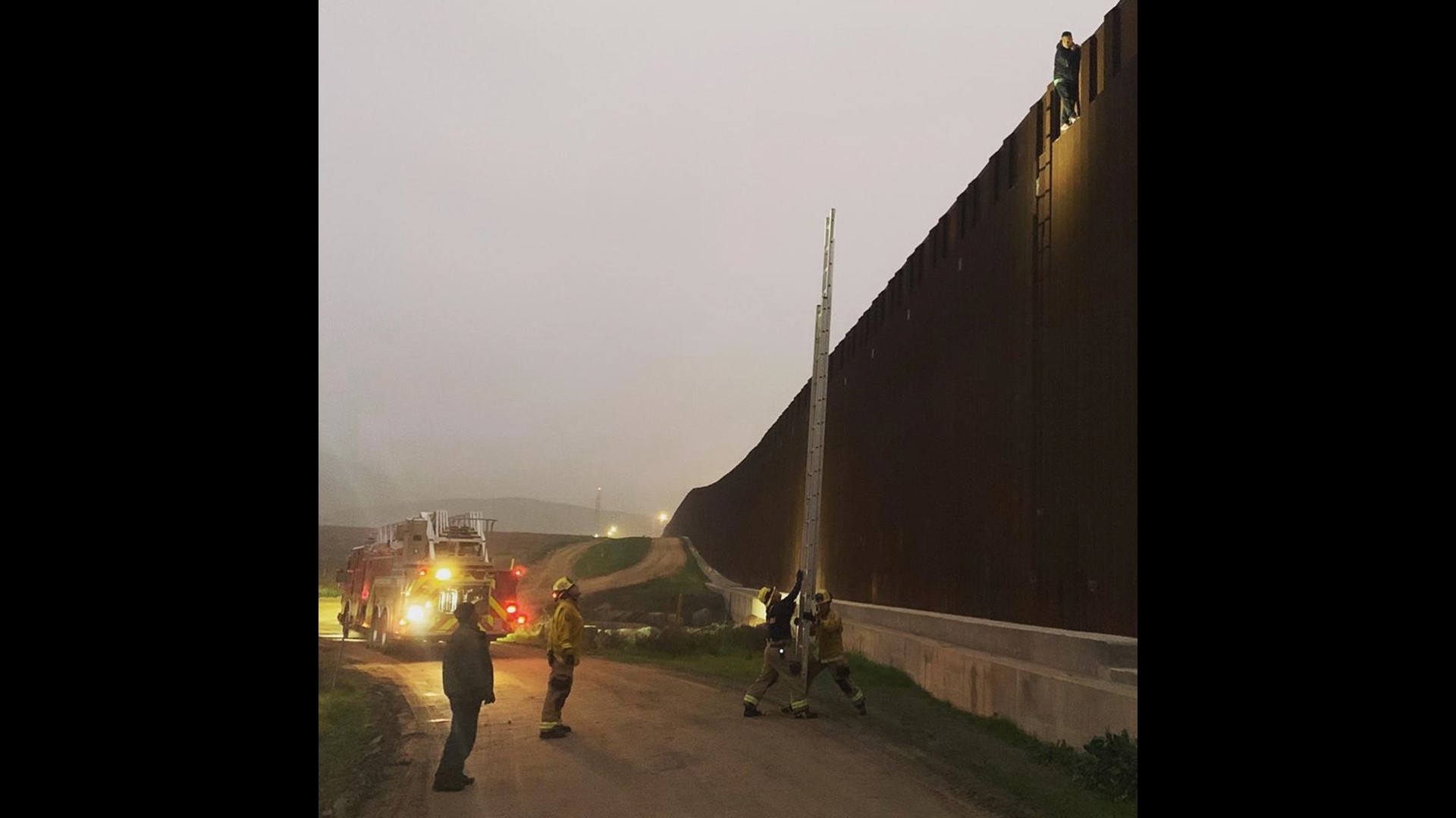 Firefighters rescue man stuck at top of Mexico US border wall | cbs8.com