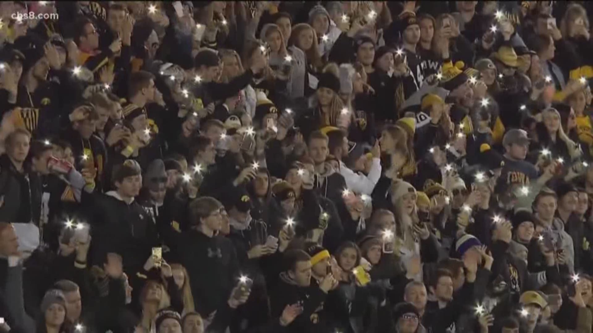 In Iowa City, it's a tradition to wave to children in the hospital that overlooks the stadium. Now, the tradition is coming to San Diego.