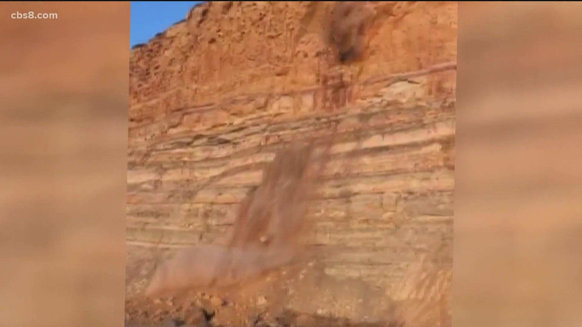 A warning after a bluff collapse in Torrey Pines causes panic that more could come down. No one was injured but video shows the huge chunk crashing down near people.