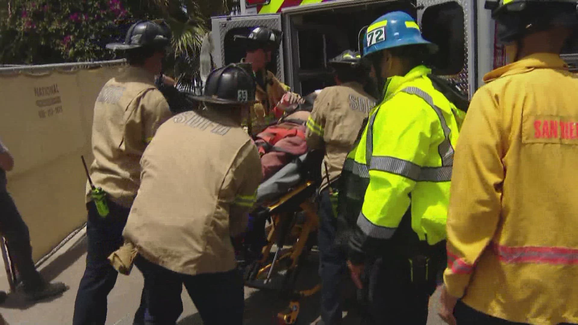 San Diego Fire-Rescue Department worked to rescue a construction worker who became trapped in a trench on a construction site in La Jolla Wednesday morning.