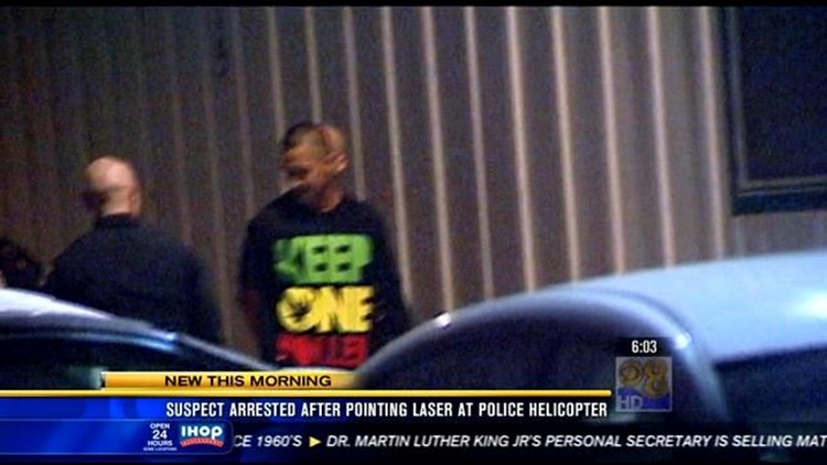 Suspect arrested after pointing laser at police helicopter | cbs8.com