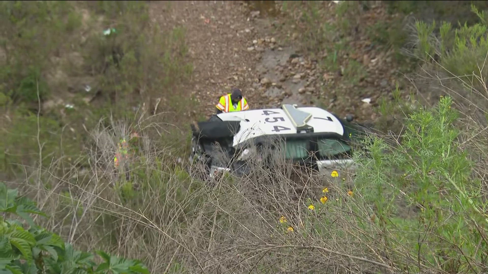 Three injured, including a San Diego Police Officer, during a traffic pursuit on the 94 Freeway early Monday morning.