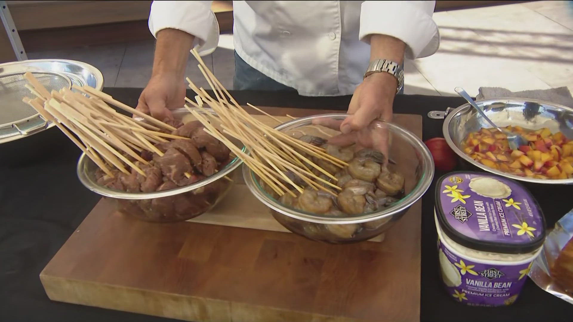 Shawn preps a full meal including Teriyaki Surf 'n' Turf Skewers and Nectarine Ice Cream Layer Cake.