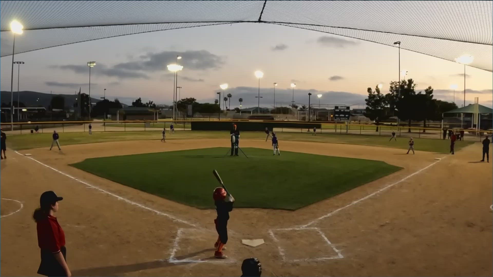 Authorities are working to determine who is responsible for shooting a gun near a youth baseball game in San Marcos.