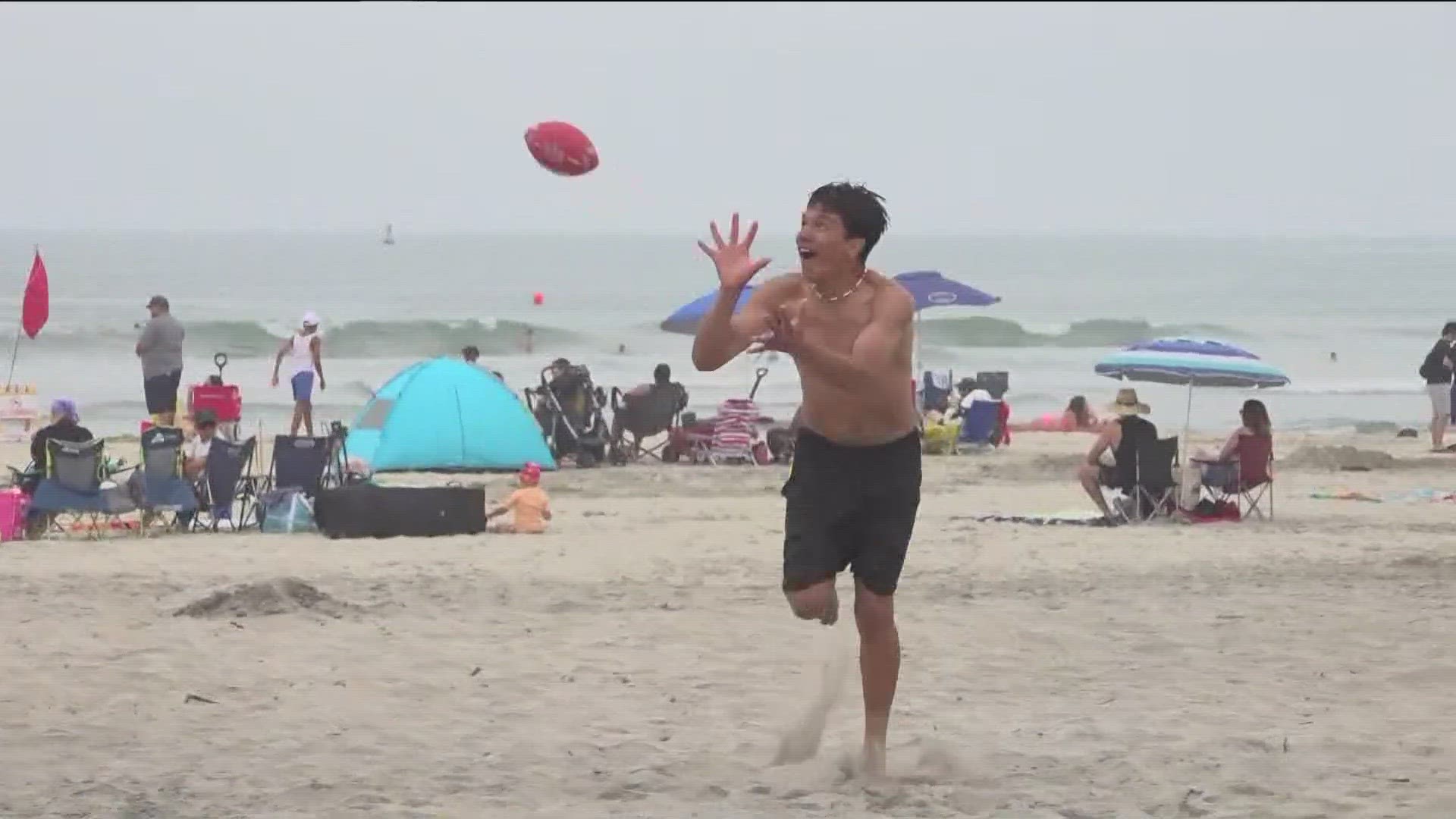 Despite the clouds, crowds took over beaches across San Diego County ahead of July Third and July Fourth festivities.