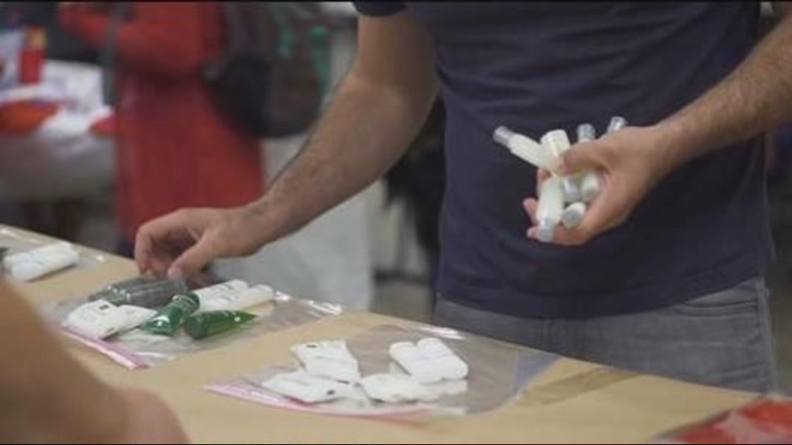 Kids packing bags of hope for the homeless as part of