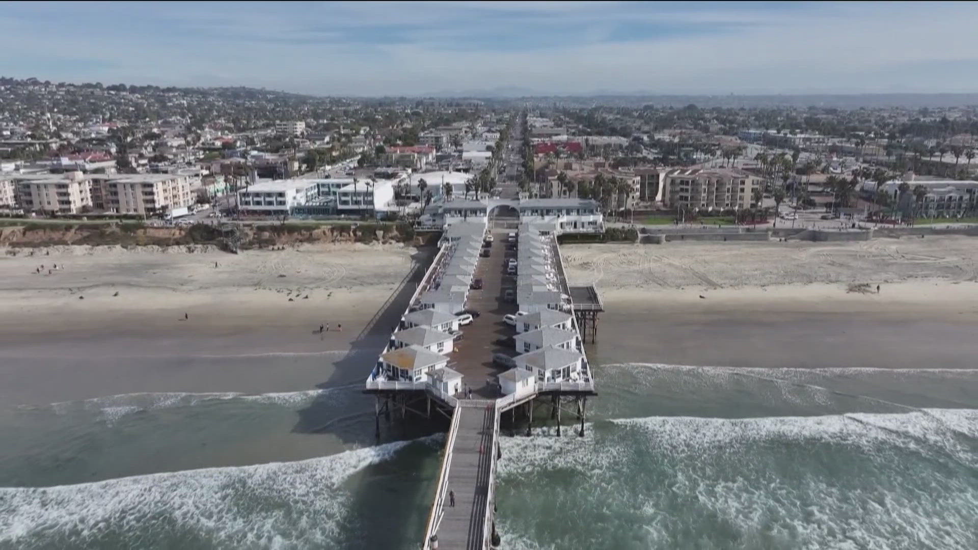 Construction crews started the second phase of repairs on the San Diego pier, with completion expected this winter, but the reopening timeline remains unclear.