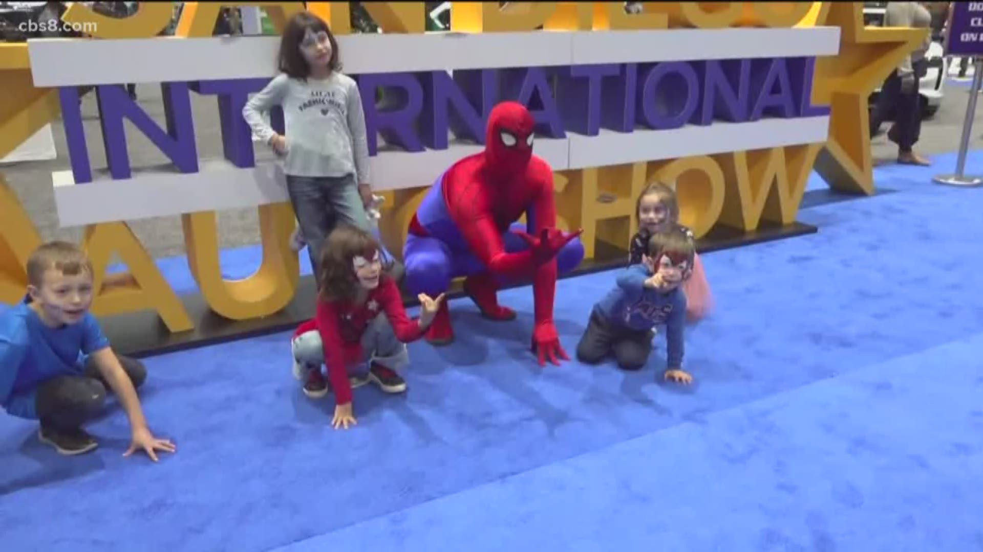 While the cars are the stars of the auto show, they took a backseat to a very popular superhero on Sunday.