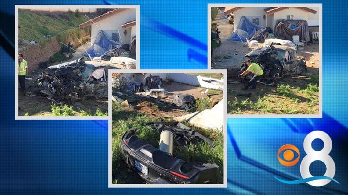 Car crashes into wall in El Cajon, lands on yard | cbs8.com