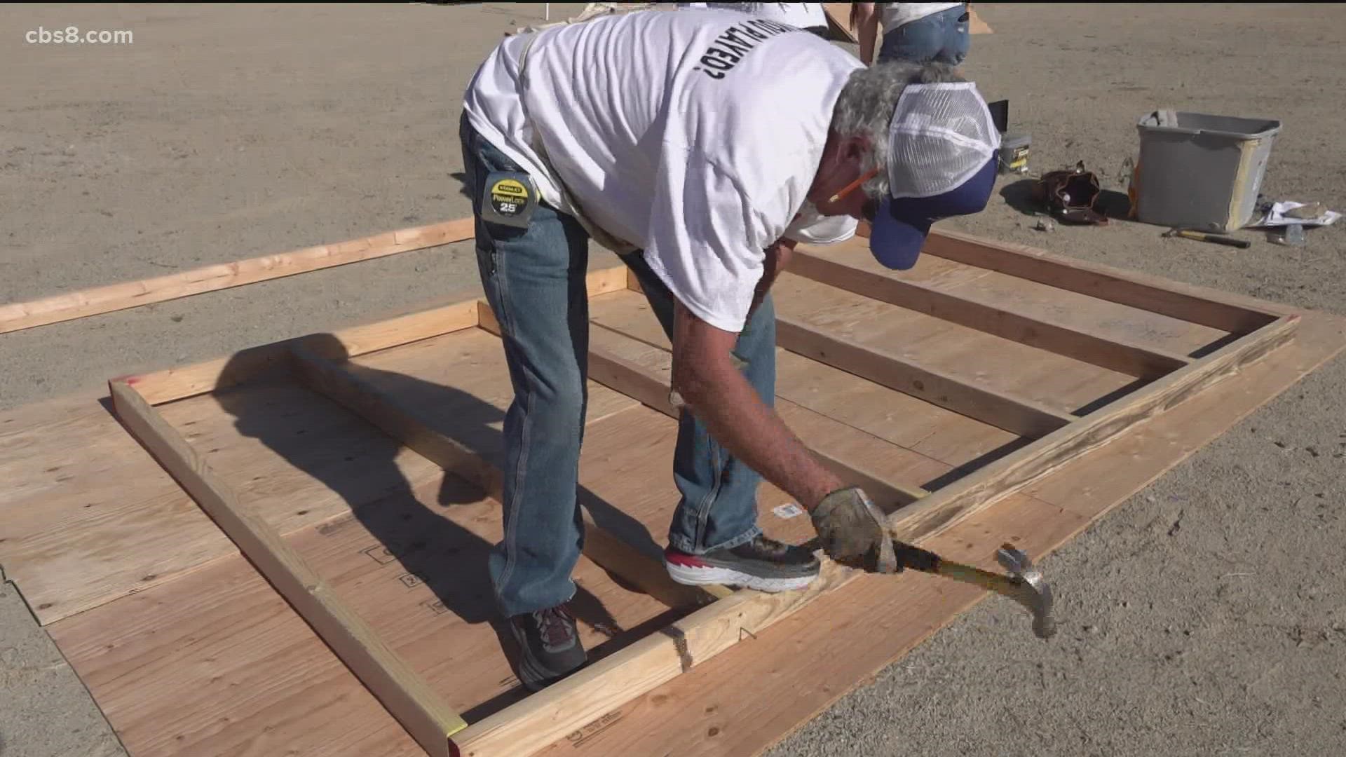 More than 120 volunteers from across the country gathered in Chula Vista to build six homes in one day for impoverished families in Tijuana.