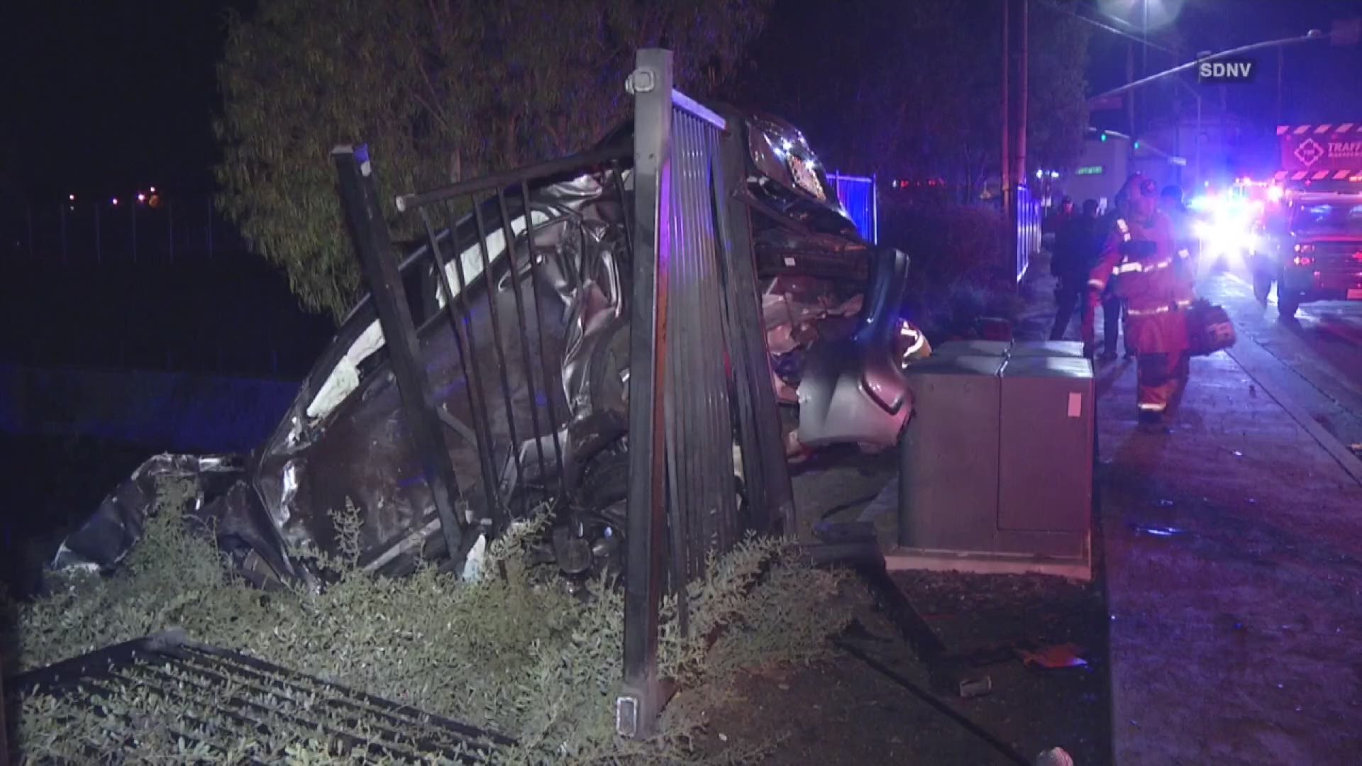The car landed on top of two electrical transformers and a fence.